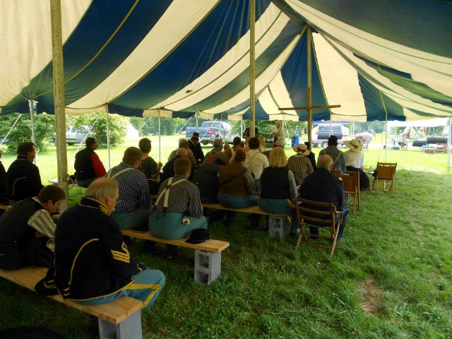 Chaplain Cheatham conducts Church service for the event